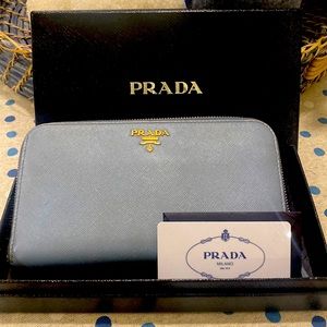 PRADA blue saffiano leather wallet w/ gold hardware (authenticity card and box)